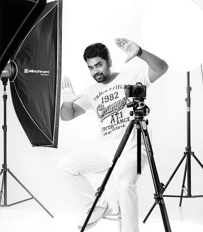 John Dinakaran behind the camera in his studio